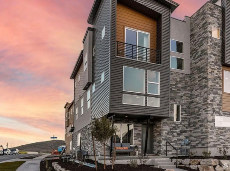 MODEL HOME FOR SALE  With $125,000 in Designer Upgrades! Discover the perfect blend of luxury, function, and modern design in this stunning, fully upgraded end-unit townhome in Park City's sought-after Silver Creek Village. Boasting $125,000 in upgrades, this 3-story gem offers 4 bedrooms, 2.5 baths, and 1,772 sq ft of bright, open living space. The exterior's elegant transitional design carries through the interior with oversized windows, custom finishes, and natural light at every turn. On the entry level, a flexible space awaits-ideal for a home office, music room, or cozy lounge. The main floor features an open-concept kitchen and living room, highlighted by a generous island, modern cabinetry, quartz countertops, and 9' ceilings-perfect for entertaining or relaxing in style. Upstairs, the private Owner's Suite is your peaceful retreat with a spa-like ensuite bath and walk-in closet. Three additional bedrooms and a spacious laundry room offer convenience and versatility for guests or growing needs.  This home offers excellent potential as a vacation rental or Airbnb, with Park City's renowned outdoor lifestyle and amenities just minutes away.    Prime End Unit | Bright & Open Floor Plan | Model-Level Finishes Don't miss this rare opportunity to own a designer-finished home in one of Park City's fastest-growing communities. Schedule your private showing today!