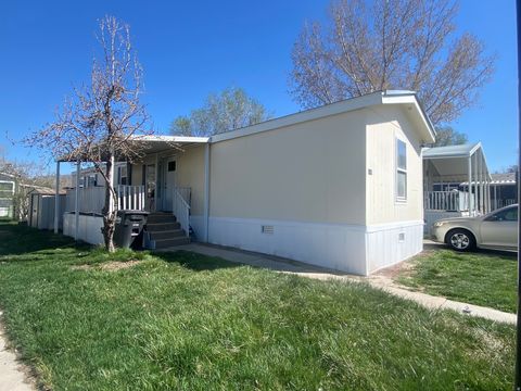 Photo of 4665 STORM MOUNTAIN DR, Taylorsville, UT 84123 (MLS # 2150803)