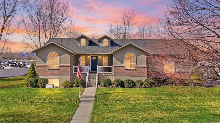 PRICE IMPROVEMENT!  Reduced $20,000 .Beautifully updated 6-bedroom, 3-bath rambler located in a highly desirable neighborhood with stunning mountain views. This home features an updated kitchen, LVP flooring throughout, a new roof, new water heater, and a newly remodeled basement complete with a theater room-perfect for entertaining and family living. Enjoy the outdoors in the fully landscaped, park-like backyard, highlighted by mature trees and tranquil pondless waterfalls and streams. Relax on the back deck, soak in the hot tub, and take in the peaceful surroundings. Garage has extra space for a work shop or extra storage Conveniently located just minutes from several parks, walking trails, and close to town. This home offers the ideal combination of comfort, style, and accessibility. Owner/Agent