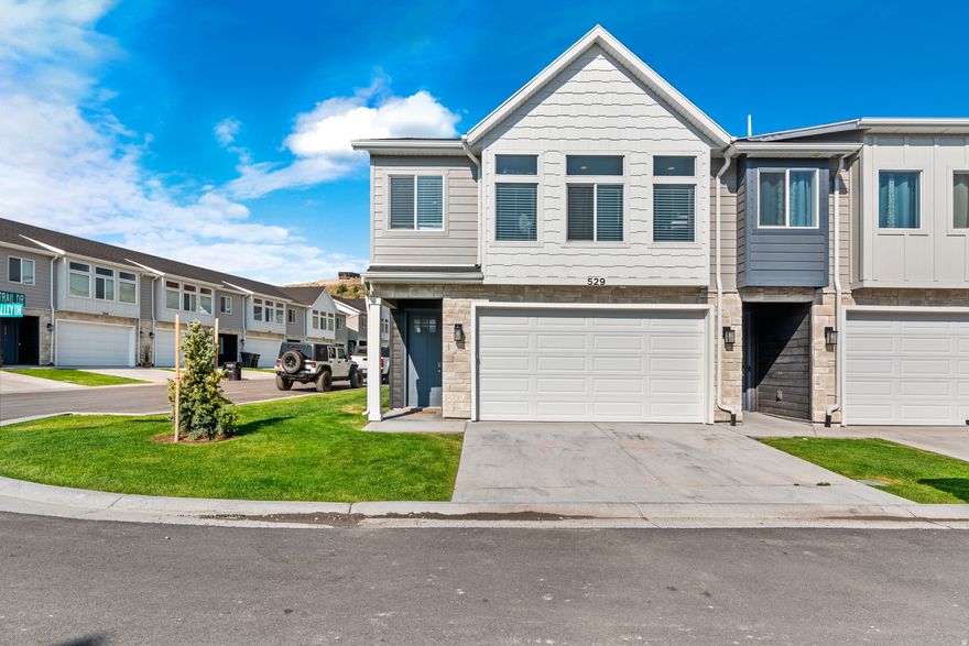 FULLY FURNISHED TURN-KEY SHORT TERM RENTAL IN PRIME LOCATION IN BEAR LAKE. Conveniently located across from Bear Lake State Park Marina and Mike's Market. This unit has guest parking spots right next to it! Open floor plan with main floor primary suite. HUGE great room upstairs with stylish electric fireplace. Comfortably sleeps 12 people and has consistently been rented out! Perfect location to ride bikes to the famous shake restaurants or walk across the street to the beach on the lake. Ample parking for your toys at the short term parking lot onsite. Plenty of bookings already lined up for this summer, perfect for you to take over and have instant income!