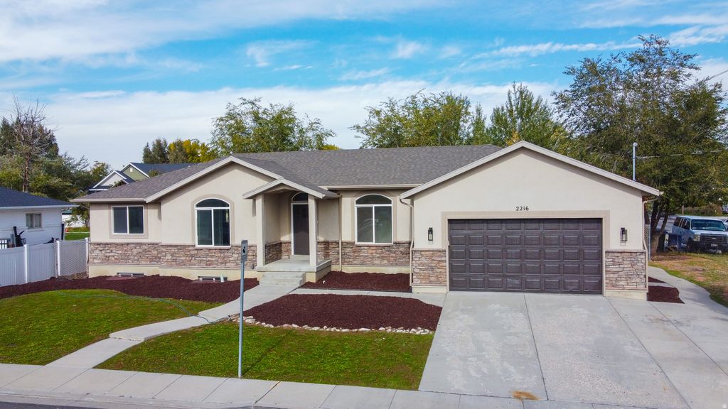 Photo of 2216 W BIRDSONG RD S, West Valley City, UT 84119 (MLS # 2137013)