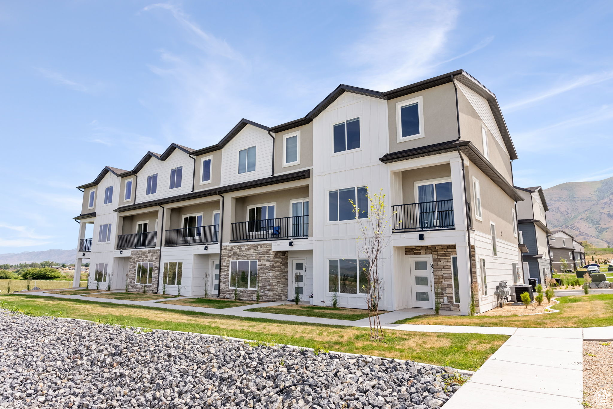 Over 2,000 sq ft townhome with 4 beds and 3 full baths! This feels like a house. Open concept with soft close cabinets and a 9' quartz island with a 20 ft sun deck. These also have an actual 2 car garage that can fit a full size truck.
