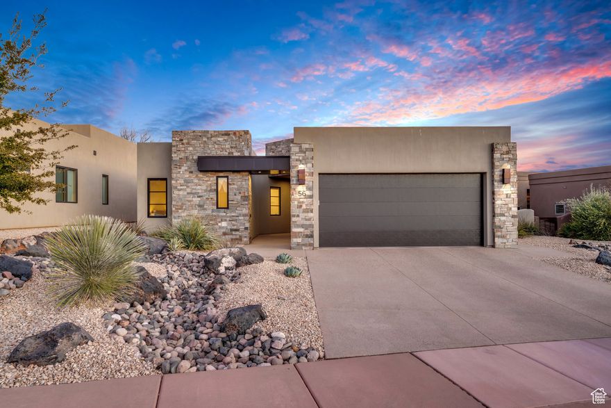 Contemporary design, built in 2019 by Tobler Homes. Open, airy layout with soaring ceilings. Sunlight floods every room. Chef's kitchen with premium finishes. Three bedrooms plus office. Spa-inspired baths. Peaceful water feature outside. Gated privacy near Entrada, Black Desert, and Snow Canyon. Spacious two-car garage. Modern luxury in the heart of Southern Utah. This neighborhood is NOT associated with Entrada Country Club. Full Equity Golf Membership purchase required to join.