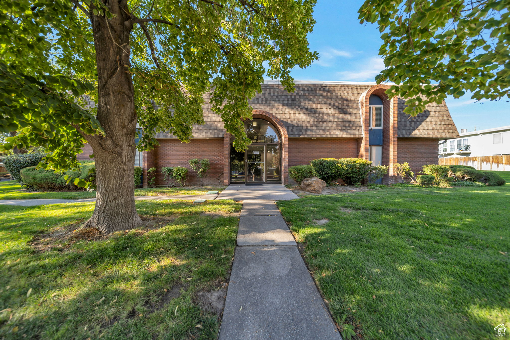 Located in a quiet neighborhood with beautifully maintained community grounds, this top-floor, end-unit condo may be the nicest condo in the community. Recently updated, it features a modern kitchen with new cabinets and countertops, plus laminate flooring throughout. Enjoy natural light from sliding glass doors that open to your own private balcony. Situated in a secure building, this home offers peace of mind along with convenience. Community amenities include a swimming pool, basketball court, tennis court, and clubhouse-perfect for staying active and social. You'll also love the prime location near Murray Park, Fashion Place Mall, and the Murray City Recreation Center, with quick access to I-15 for an easy commute to downtown Salt Lake City.
