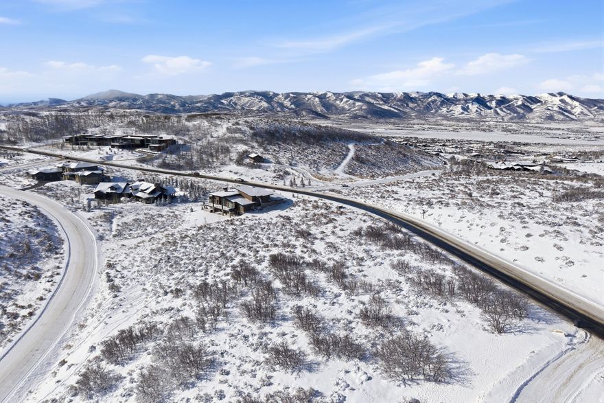 Premier Promontory Homesite with Uinta Mountain Views -- Build your dream mountain retreat on this beautiful 1.15-acre homesite in the private gated community of Promontory Club. Ideally positioned along Promontory Ranch Road, this gently sloping lot offers expansive easterly views toward the majestic Uinta Mountains, with the potential for southwestern views capturing Park City's renowned ski resorts and dramatic Wasatch sunsets. The gradual topography provides an excellent building envelope, allowing for a variety of architectural possibilities while maximizing the surrounding mountain vistas and natural landscape. Ownership in Promontory provides access to one of the most amenity-rich private club communities in the Rocky Mountains. Members enjoy world-class golf on courses designed by legends such as Pete Dye and Jack Nicklaus, multiple clubhouses with dining and social spaces, a luxury spa and fitness center, tennis and pickleball courts, equestrian facilities, miles of private trails, and family-focused amenities including The Shed clubhouse and beach-style lake club. Promontory's 7,200-acre private mountain community is designed for recreation, connection, and multi-generational living, offering year-round activities from golf and hiking to skiing and outdoor adventures, all just minutes from the historic charm, dining, and world-class skiing of Park City. A rare opportunity to build a custom home in one of Park City's premier luxury communities while capturing breathtaking mountain views and the exceptional lifestyle that Promontory is known for.