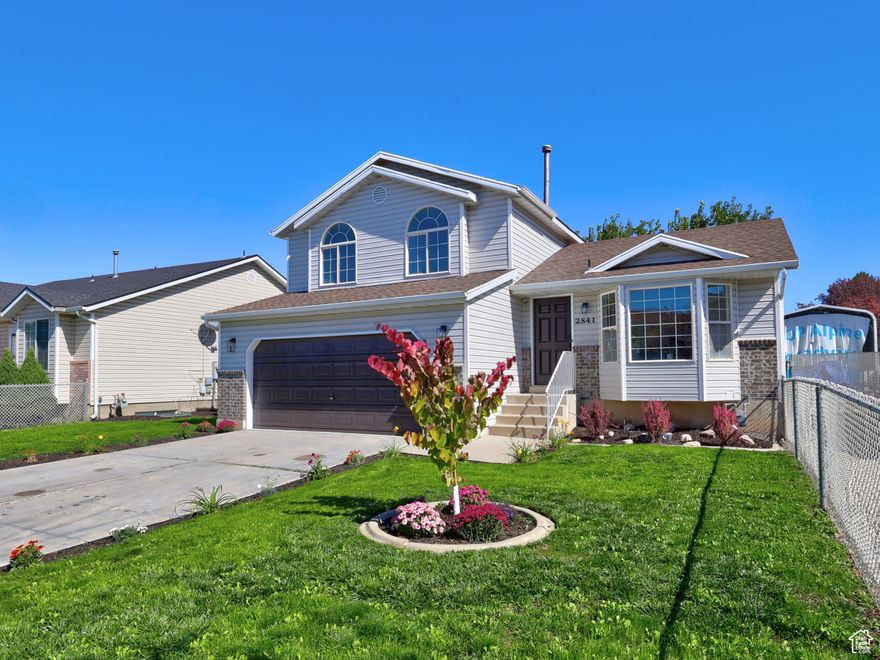 Welcome home to this fully remodeled gem in the heart of West Valley City! Every detail has been thoughtfully updated, blending modern style with timeless comfort. The bright, open floor plan features new flooring, fresh paint, updated lighting, and stylish finishes throughout.  The kitchen has been completely transformed with new cabinetry, countertops, backsplash, and stainless-steel appliances-perfect for entertaining and everyday living. Bathrooms have been beautifully redone with designer tile, modern vanities, and new fixtures. Spacious bedrooms offer plenty of natural light and comfort.  This home boasts standout curb appeal with a fresh exterior, brick accents, and a rich dark garage door. Large windows, including a bay window, enhance its inviting design. The yard is newly landscaped with lush lawn, colorful flower beds, and a decorative tree. Nestled on a quiet street in an established neighborhood, it's move-in ready inside and out.  Don't miss your chance to own this stunning, fully updated residence-schedule your showing today!