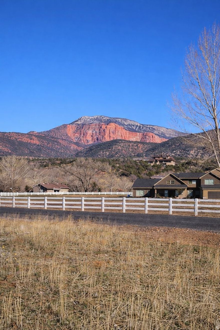 Endless Possibilities on 5 Scenic Acres in New Harmony. Bring your vision and build your dream home on this breathtaking 5-acre parcel, nestled just below the stunning red cliffs of Kolob Canyon and offering panoramic views, including the iconic ''5 Fingers'' of Kolob Mountain. This property combines natural beauty with convenience - located perfectly between Cedar City and St. George, you'll enjoy peaceful rural living without giving up access to shopping, dining, and essential services. Whether you're looking for a private retreat, a custom estate, or a basecamp for outdoor adventure, this land offers the space, setting, and inspiration to make it your own. No HOA. Unmatched mountain views. Easy access to I-15 and Zion National Park. Ideal for nature lovers, outdoor enthusiasts, or anyone seeking wide-open space. Let your imagination take the lead, your dream begins here.