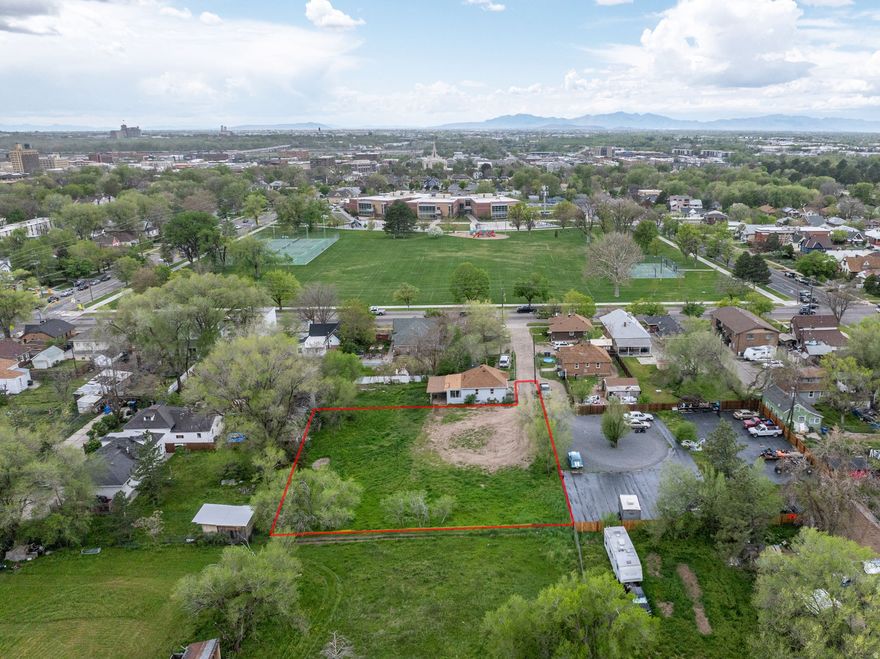 Incredible opportunity minutes from Ogden's growing Downtown. Large spacious lot with tons of possibilities - plenty of room to build your dream home along with detached shop, garage and ADU/home office. Flat terrain with great views of Mount Ogden and Ben Lomond. This is somewhat of a flag lot with only one access point from Monroe Blvd via private lane with a recorded right-of-way easement. There are no stubbed utilities and no functioning sewer and water laterals to the site. Price reflects the need to address these development items. This lot is across the street from Liberty Park and surrounding schools, 5 minutes to Ogden's Downtown Historic 25th Street District and minutes away from world-class ski resorts in the other direction through Ogden Canyon. The lot is in the R-1-5 zone, which is for single-family residential use only. Higher density is not approved due to zoning code restrictions. Design guidelines for this zone including density, architecture, building materials, etc can be found on Ogden City's Planning/Zoning website. For any specific questions, please refer to the Ogden City Planning/Zoning Department website or call City Planning directly. It's your blank canvas - No HOA/CC&Rs! ** Seller Finance Available with acceptable terms, please contact agent before sending such offers.**