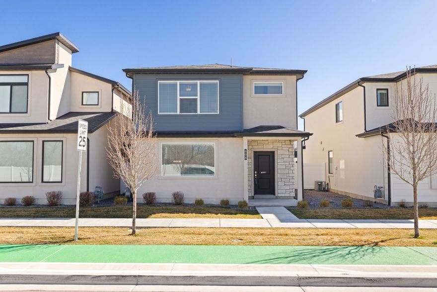 Rare opportunity to own a detached single-family home priced similar to townhomes! Built in 2021, this thoughtfully maintained home offers the privacy of no shared walls, no front neighbors, and a quieter street location on the edge of the community.  The bright open-concept layout features upgraded finishes throughout, including granite/marble countertops, fully tiled bathrooms, two-tone flooring, and modern clean lines. The spacious primary suite includes a remodeled bath with an oversized tub, while a small built-in nook offers flexible space for pets, kids, or storage.  Enjoy a fully fenced, low-maintenance yard with turf-perfect for relaxing or entertaining-with landscaping maintained by the HOA. Additional highlights include an extra-width two-car garage, central air, mountain views, and abundant storage in the garage, laundry, and bathrooms.  Community amenities include a clubhouse, pool, playground, trails, and recreation areas, all with convenient freeway access nearby.  More privacy, more space, and a fenced yard - all at a price typically reserved for townhomes.