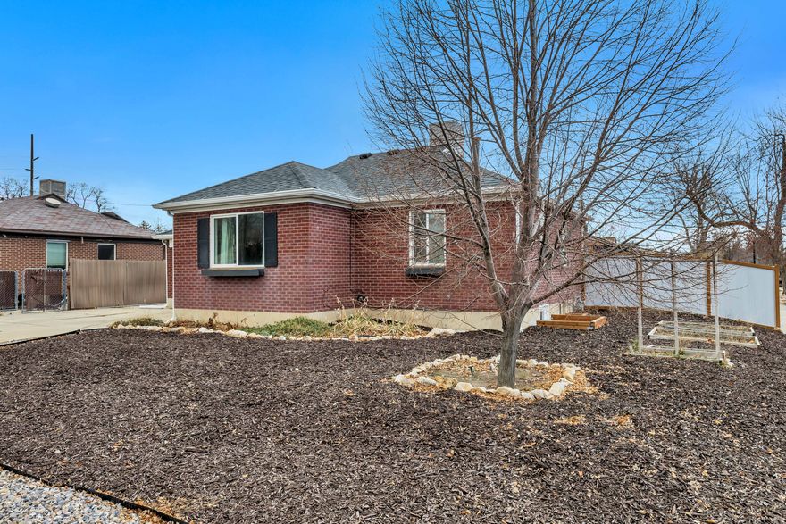 **Open house Jan 31st from 11-1**Welcome to this classic Rose Park gem, perfectly located just minutes from downtown Salt Lake City yet tucked away on peaceful, tree-lined streets in one of the city's most investable neighborhoods. Enjoy quick access to I-15, I-215, and public transportation, making commuting a breeze. This well-maintained home blends vintage character with modern updates, featuring original hardwood floors, renovated bathrooms, renovated kitchen cabinets, newer windows, a newer roof, and an updated basement family room with recessed lighting. The basement is fully finished, with a new LVP flooring section. The laundry room is conveniently located on the main floor. Step outside to a fully fenced backyard, ideal for entertaining with a pergola-covered patio and a spacious storage shed. Stroll or bike to nearby Riverside Park, the Jordan River Trail, grocery stores, and the famous Red Iguana restaurant. Plus, stay connected with Google Fiber already installed.