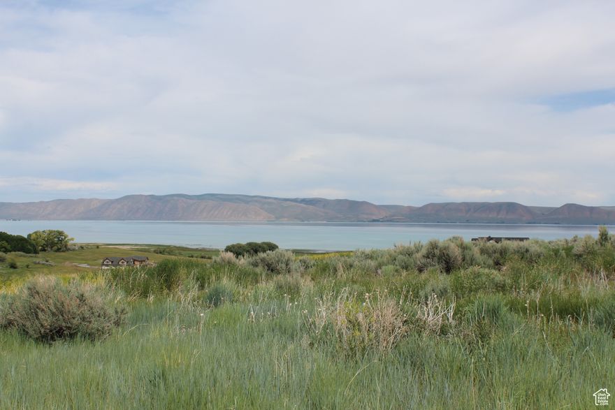 The Reserve at Bear Lake, PH 7 Lot 181 0.7 acres -- almost flat building lot with all utilities stubbed, gated with paved roads maintained year-round. Great amenities: Clubhouse with fitness room, two heated pools (seasonal), hot tub (year-round), splash pad, covered poolside pavilion, sports court, playground, and 1800' of gated beach access. 10 minutes to launch watercraft at Bear Lake State Park marina; 25 minutes to enjoy skiing/snowboarding at Beaver Mountain Ski Resort. ATV/UTV, snowmobiling, snowshoeing, hiking, and mountain biking in Fish Haven Canyon can be accessed from The Reserve.