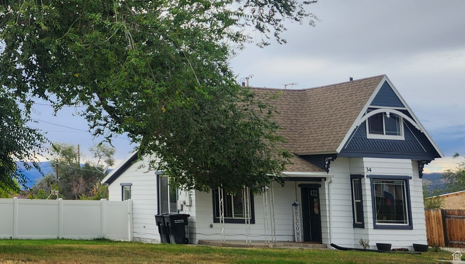 This super cute home has been updated throughout while maintaining the character of the original build & having modern touches. And there is so much storage. 2 bd on the main floor (1 could be a den), 1 bth. Kitchen has new counter tops, cabinetry, hardwood floors, appliances, a pantry & a partial wall with original brick exposed. Nice dining area leads to patio. Upstairs leads to a lovely sitting room, 2 bdrms & a bath. Sale includes 1/4 share of Pleasant Creek Irrigation water which is pressurized by Mt. Pl City. Large Shop/Garage will hold 2 cars tandem, has a wood burning stove & 2 LARGE rooms for storage, workshop, Gym, She Shed and/or Mancave. Sq. ftg is an estimate. Boundary lines are per county info. Buyer to verify all info. Property is zoned res/com so there is business opportunities, here.