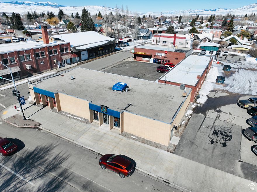 Fully remodeled business building in the heart of Montpelier Idaho.  Building is currently being used as a boutique, office space, and a salon. New plumbing, electrical, wiring, cabinets, bathroom, ceilings, tankless water heater. Call listing agent for full list of improvements. Seller is willing to sell the existing salon equipment and boutique at an additional cost. There's a storage room in the basement not pictured and an office space on the main floor. Building comes with the parking lot on the East and North side of the building offering plenty of off street parking spaces.