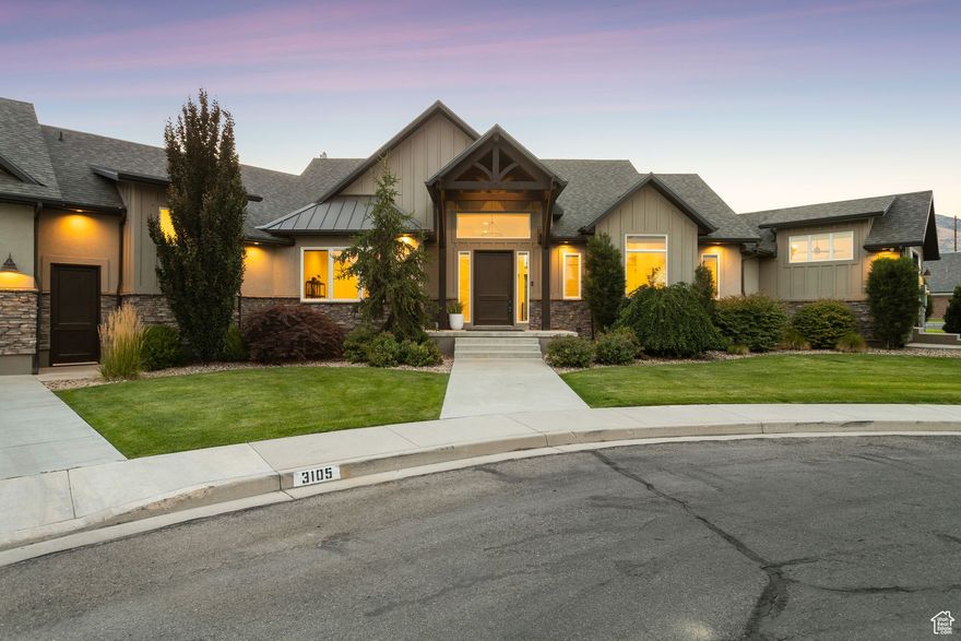 Experience timeless elegance and modern comfort in this custom-built rambler, completed in 2017 and spanning over 6,400 square feet. Designed for both everyday living and grand entertaining, the home offers 6 bedrooms, 5.5 bathrooms, and a thoughtfully designed floor plan that blends open-concept spaces with private retreats. The heart of the home is a sprawling great room with soaring vaulted ceilings and seamless flow into the custom kitchen, outfitted with premium Bosch appliances and tailored cabinetry. A dedicated whole-home SONOS sound system adds ambiance throughout. Above the oversized 3-car garage, a versatile bonus suite features its own bathroom, walk-in closet, and mini-split HVAC system - perfect as a guest suite, office, or media room. The lower level is equally impressive, boasting a full second kitchen, 3 spacious bedrooms, 2 full bathrooms, and a gym/flex room - ideal for multi-generational living or extended stays. Enjoy year-round outdoor living from the covered deck overlooking a private, landscaped backyard. Additional features include a solar-powered Generac generator, RV parking, and a custom-built shed. This home is the perfect balance of luxury, versatility, and thoughtful design - all in one unforgettable property.