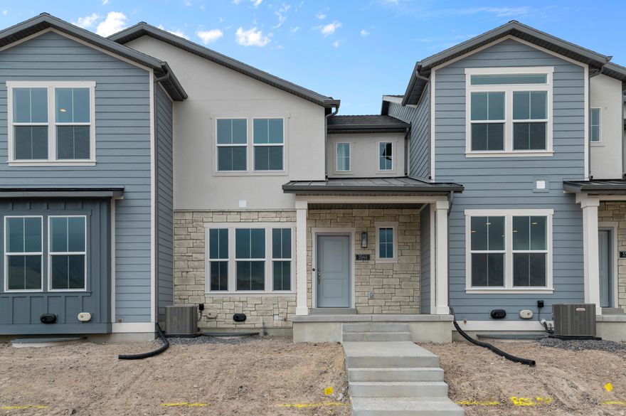 Come see this beautiful Bellevue Townhome where modern design meets functional living! Featured you will find a stylish kitchen with gray laminate cabinets, quartz countertops and stainless steel gas appliances. Interior highlights include a mix of laminate hardwood, vinyl tile, and carpet flooring. The finished basement provides additional living space for relaxing or entertaining. Final touches include a Craftsman-style base and casing, tankless water heater and half-wall at the stairway. The elegant owner's suite offers cultured marble shower surround with satin and brushed nickel hardware for a relaxing retreat. Comes fully landscaped and located in a great community near schools, parks, shopping and more! Come check it out today!