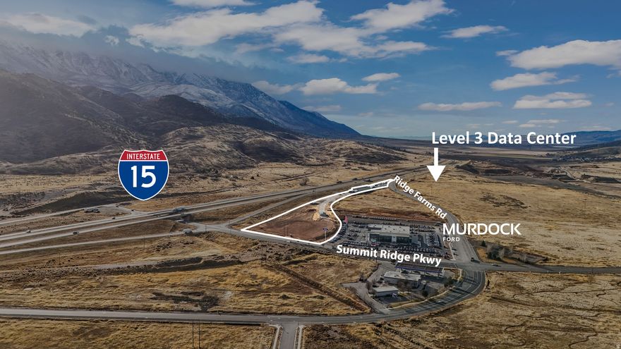 Exceptional opportunity to own approximately 9+ acres of prime commercial land in a rapidly expanding growth corridor. This highly visible property offers strong frontage, convenient access, and excellent development potential for retail, automotive dealership, hospitality, office, and mixed-use projects.  The property includes an existing approximately 8,400 square-foot warehouse featuring refrigerated space and loading docks, along with approximately 2,200 square feet of office space, providing immediate functionality for operations, storage, or income potential. A leaseback opportunity may also be available.  Strategically located near the planned development of a Level 3 Data Center, the area is expected to benefit from significant infrastructure investment, employment growth, and increased demand for nearby commercial services, enhancing long-term value and visibility.  Utilities are accessible, with gas stubbed nearby, supporting future expansion or redevelopment. Surrounded by ongoing residential and commercial development and offering strong traffic exposure with access to major transportation routes, this site presents a compelling opportunity for investors, developers, and owner-users.  Buyer to verify zoning, utilities, access, square footage, and development requirements.
