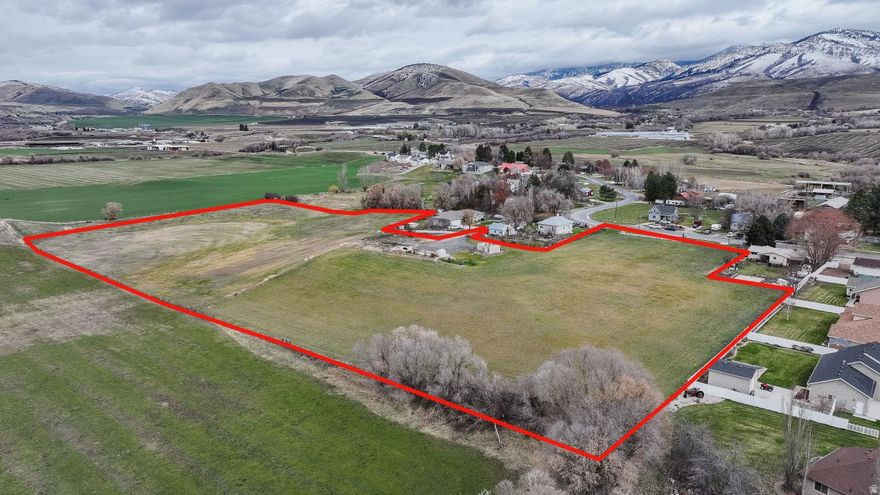 This is a remarkably unique oppurtunity to own a slice of heaven in Franklin Idaho.   Two parcels with flat areas to build and keep the hilly areas in pasture for your animals.  Part of the property is within city limits (about 6 acres) and part in the County.  2 access points to get to your property as well.  Positioned in the heart of Franklin with easy road access come and make this acreage your own private sanctuary.  Easy to show and there is even an old historic rock house on the property!  Acreage figures are provided as a courtesy estimate only and were obtained from Franklin County Assesors' office- Buyer is advised to obtain an independent measurement.