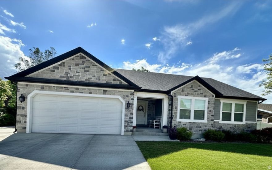 Beautiful & immaculate describes this 6 bedroom home. Open and spacious floor plan. Gas fireplace. Custom white kitchen cabinetry  with solid surface counters, Gas range. Custom white cabinets in laundry room. Large family room in basement. Huge workout room or additional storage area. Covered patio in back yard. RV Parking. You will love this great family home located in the heart of town.