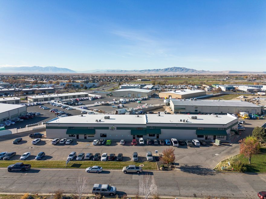 Great investment opportunity! Currently leased by a nutraceutical and supplement manufacturer, this building supports specialized production uses with upgraded power, warehouse, ample dock and grade-level loading. Best if purchased with adjacent 855 N. McCormick Way. Built in 1999, this well-built distribution warehouse and office building consists of non-combustible exterior walls (block).  It features over 9002 SF of office and approximately 25,155 SF (including 4,501 SF mezzanine) of warehouse/manufacturing space.  This building's layout is set up for numerous industrial uses including pharmaceutical and supplement type manufacturing, storing and primed for shipping logistics.  The building is fully climate controlled with both heating and cooling systems and features industrial-grade lighting, ventilation, and exhaust systems, as well as a comprehensive fire-sprinkler set up for safety and compliance. The exterior is professionally improved with paved parking.