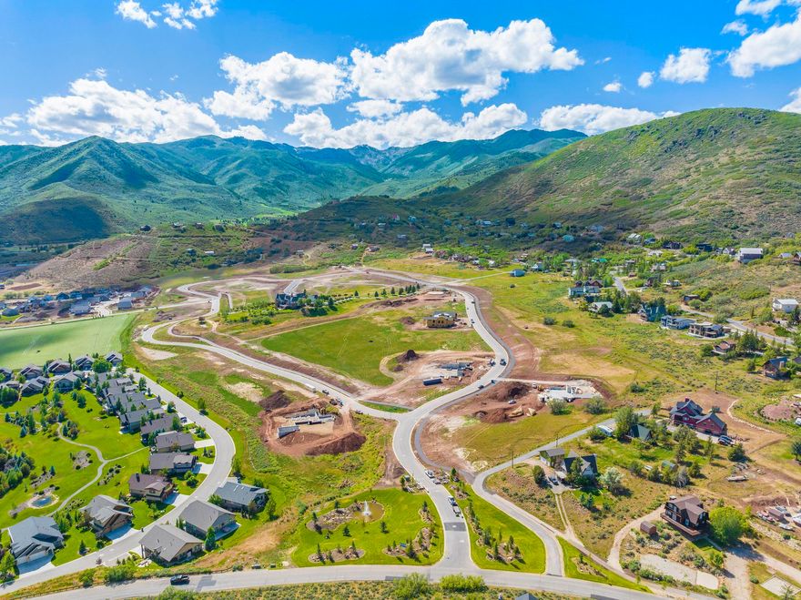 Incredible Opportunity to own one of the prime view lots, LOT #34, in the highly desirable and exclusive community of The Reserve. This is a luxury development transforming the amazing 83 acre Zenger Estate into a well-designed, fully planned community of 48 custom homesites. There are 30 acres of beautiful open space surrounding this development and this particular lot backs to the walking trail. Amenities include a swimming pool, sports courts, picnic gathering areas, waterfalls and miles of beautiful walking trails. This amazing location provides sweeping panoramic views that include Snake Creek Canyon, Deer Creek Reservoir, and Mt. Timpanogos.