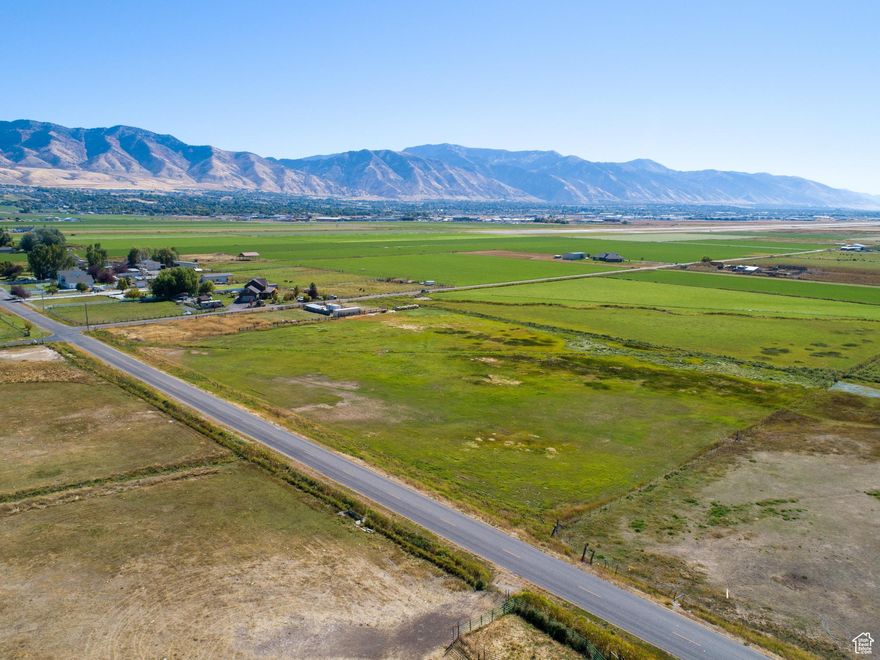 Opportunity awaits with this prime 6 acre corner lot located in beautiful south Smithfield, right near the Hyde Park border. With a shallow well with water rights for domestic and livestock use in addition to irrigation shares; plus the surveys and septic studies have already been completed! In talking with Cache County, this can be subdivided into two lots. This great piece of Cache Valley is one you don't want to miss! Call today!