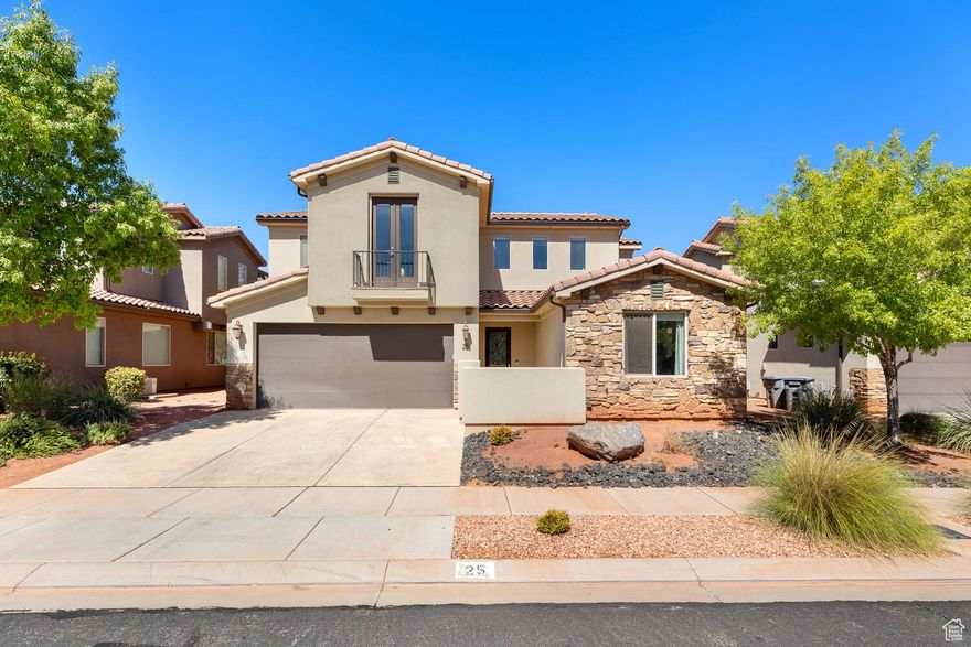 Discover the ultimate investment or second home in one of Utah's most sought-after destinations! This stunning 4-bed, 5-bath home is zoned for short term rentals. With two expansive gathering spaces, a spacious kitchen and dining area, and both upper and lower patios (complete with a private hot tub), this home is designed to host large groups, family getaways, or retreats year-round. Located in a vibrant resort-style community, your guests will love the amenities: a water park with thrilling slides and a lazy river, two oversized pools, multiple hot tubs, pickleball courts, sand volleyball, and nearby walking trails. With Snow Canyon State Park and Zion National Park just minutes away, this property offers endless adventures everyone will love.