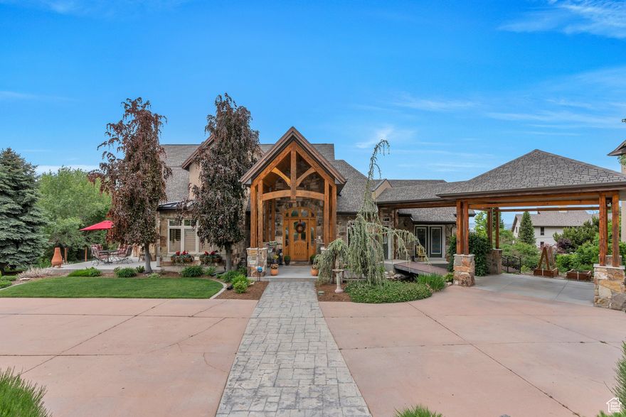 Amazing one of a kind home with main floor living. Home features lots of windows for the fantastic views of the Lake, Valley and Mountains from various locations thru out the home. Open Floor plan concept great for entertaining. Vaulted Wood Bean Ceiling in the great room. Sun room with water hook ups and drain. Office or 4th bedroom on main. KOI pond and water fall (KOI Fish stay).  Outstanding workmanship and quality such as Custom Knotty Alder Cabinets thru out, High Maxx counter tops, Sub Zero Refrigerator, Wolfe Gas Counter Top Range, Wall Oven, Microwave, Warming Oven and Dishwasher, Central Vac. European shower doors, Power Flush toilets. Home has 3 kitchen, and1 kitchenette in bonus room. ADU / Legal apartment, Home is wheel chair accessible with 36 in. doors and 48 in. hallways. Milgard Windows.  Salt Water Pool, Hot Tub, Pergola covered patio by pool with BBQ hook ups for entertaining. Large deck off main kitchen with BBQ on upper deck . Four furnaces and Central Air, Soft Water, Two water heater ,Hot & Cold water spickets in garage. Intercom system and so much more.  WITH THE  2 lots are  included to make .96 acre lot. Please include these Tax ID # 40-062-0016 and Tax  ID #40-062-0012 . This is must see home to be appreciated SQ FT is taken from and old appraisal and is provided as a courtesy. SQ. FT. and all information to be verified by Buyers.