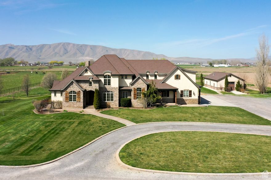 DO NOT DISTURB OCCUPANTS!!  ALL VISITORS MUST CHECK IN AND BE ESCORTED BY LISTING AGENT! Discover a rare opportunity to own an expansive 8.75-acre estate in the serene landscape of Benjamin, Utah. This remarkable property boasts an 8,554 square-foot custom-built residence designed for both grand living and versatile function. Since 2012, it has been the home of Maple Lake Academy, a specialized program for boys with verbal and non-verbal learning disabilities. Step inside to find a two-story great room, a gourmet chef's kitchen, and five generously sized bedrooms, each offering comfort and privacy. Six well-appointed restrooms cater to both residents and guests. The former six-car garage has been transformed into dedicated office spaces, classrooms, and a library  ideal for a corporate retreat or a bespoke educational venture. Just steps away from the main residence, an expansive 1,492 square foot freestanding workshop, equipped with a custom shop vacuum system for efficient dust collection, offers exceptional space for hobbies, projects, or storage  perfect for cabinet making or other wood projects. The outdoor space is equally impressive. Enjoy a private basketball court, a thriving garden, and a vast covered patio complete with outdoor restroom access  perfect for entertaining or enjoying Utah's stunning sunsets. The property's expansive grounds offer endless possibilities for expansion or customization. Key Features:  8,554 SF Custom Residence (Built 2007)  1,492 SF Freestanding Workshop with Custom Shop Vacuum System (Built 2013)  8.75 Acres   5 Bedrooms, 6 Bathrooms  Gourmet Chef's Kitchen  Two-Story Great Room  Converted 6-Car Garage (Offices, Classrooms, Library)  Private Basketball Court  Established Garden  Covered Patio with Outdoor Restroom  Potential for Corporate Retreat, or Bespoke Educational Venture Shown By Appointment Only. Please Do Not Disturb Current Residents.