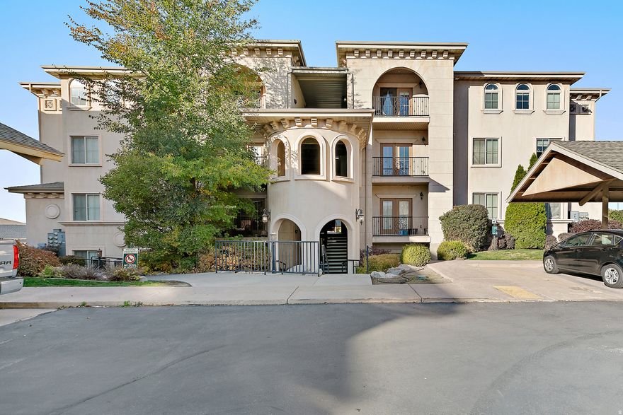 This beautiful, fully updated condo features new carpet, fresh paint, and new blinds. Unique to this condo are the stunning views of the lake and mountains with an unbeatable location with quick access to I-15. You'll love the luxury clubhouse with movie room, pool, hot tub, gym and yoga room. Within walking distance of shopping, restaurants, and local conveniences. HOA provides cable, internet, water, sewer, garbage, and snow removal. This unit includes 3 assigned parking spaces. Don't miss this incredible opportunity!