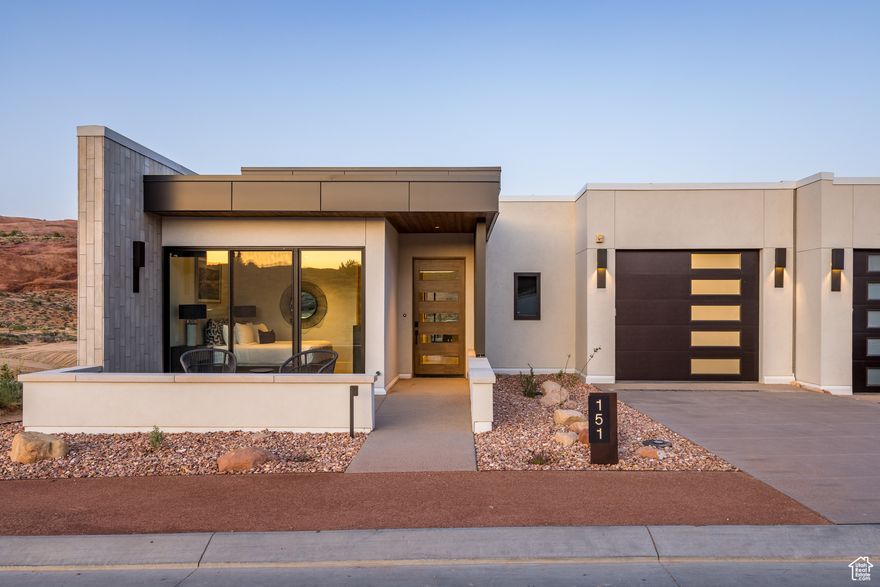 LIONSBACK RESORT  An unparalleled experience of discovery and respite. Designed to blend in with its natural landscape, Lionsback Resort offers an unrivaled launchpad for all the adventure, exploration and relaxation Moab has to offer, all while treading lightly on the land. While its 175 acres of land with 70% open space offer a sense of seclusion, Lionsback Resort is a stone's throw away from the City of Moab, so you're never far from community and culture.  This timeless 1 story Strata Casita meets sophisticated design, immersing you in the surrounding desert landscape with both indoor and outdoor living. An abundance of large windows gives you the unobstructed views of sunlight reflecting off red rock fins and the sunset alpenglow on the La Sal Mountains.  Earthy desert hues from the Fireclay tile backsplash and  Italian cabinets are beautifully offset by clean, modern lines from the timeless quartz countertops.  Thoughtful design represents the surrounding terrain, all while incorporating high-end finishes, from Wolf and Subzero appliances to a 5-piece spa-like bathroom with wet room, soaking tub and Waterworks plumbing fixtures, to the built-in speaker system with Sonos amp. Offering 2 en suite bedrooms, this luxury home has short-term rental zoning and now the price includes a turnkey furniture and houseware package. When the wild terrain is calling, Lionsback Resort offers on-site access to the Mill Creek Trail and Hells Revenge 4x4 trail, standing at the gateway of the world-renowned Sand Flats Recreation Area, home of the famous Slickrock Trail, two National Parks, Arches and Canyonlands, and the Colorado River for limitless discovery.