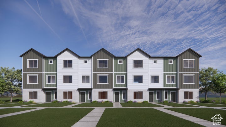 Multi-family residential building featuring a mixed-material exterior, vertical paneling, gabled rooflines, and…