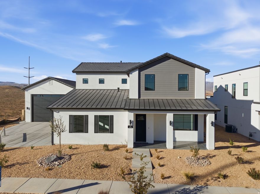 Be the first to pull into the driveway of this stunning, newly completed corner lot home in Desert Color.This new 4 bedroom home is the Allegiant DM + Balcony Floorplan and crafted by CareFree Homes - Southern Utah's trusted builder. CareFree delivers service that exceeds our home buyers expectations before, during and after the sale! Located with easy access to major highways and just minutes from exciting new commercial developments. This home is ideally situated for both work and play and includes Oversized RV Garage (42'Lx25'Wx16'H), 2x6 construction, 2'' faux wood blinds, epoxy garage floors, fully landscaped including turf, soft close drawers.