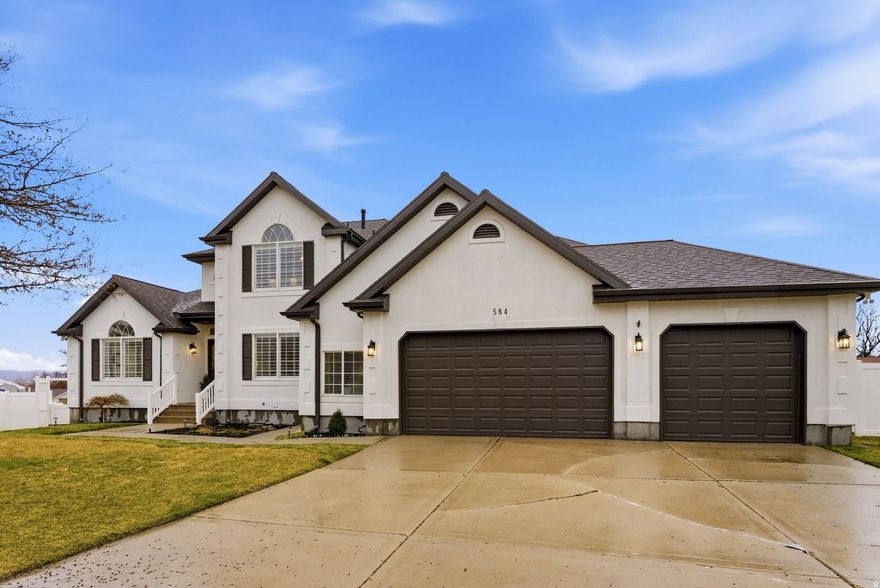 Discover a rare opportunity to own a fully updated and truly move-in ready residence in one of Draper's most sought-after, low-turnover neighborhoods. Nestled on a sprawling .43-acre lot with no backyard neighbors, this 6-bedroom, 3.5-bath home offers the privacy and space modern buyers crave. No detail has been overlooked. From a new HVAC system and water heater to fresh interior and exterior paint (including the shed, deck, and interior of the garage), new garage doors, and new carpet throughout the basement, every update reflects meticulous care. Impeccably clean and beautifully presented, the home features a gourmet-inspired kitchen and stylishly updated bathrooms. New light fixtures shine throughout, and for a truly seamless move-in experience, all appliances are included-highlighted by a brand-new dishwasher. The home is filled with natural light and has been conscientiously maintained with numerous thoughtful finishing touches throughout, making it truly turnkey. The sun-drenched floor plan flows into a finished walkout basement featuring a second kitchen-perfect for multi-generational living, a guest suite, or a potential rental (buyer to verify). Step outside to an oversized, flat, and fully usable backyard-a true standout for the area. Enjoy mountain views and the peace of a cul-de-sac while remaining minutes from highly-rated schools, shopping, parks, freeways, and Draper TRAX for an easy commute. Homes of this caliber and lot size rarely hit the market in Draper. Buyer is advised to verify all information independently.