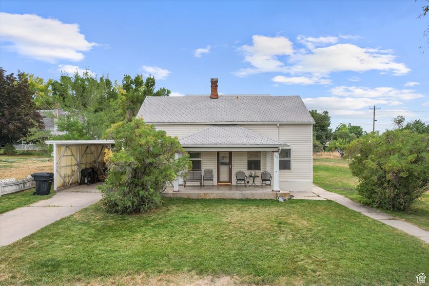 Discover charm, space, and versatility in this 3,834 sq ft home on a half-acre in the heart of Mt. Pleasant. With seven fruit trees, a generous garden, and inviting outdoor spaces-including a covered front porch and enclosed side porch-this property blends classic character with modern possibilities. The original portion of the home (built in 1880) offers timeless woodwork, built-in cabinetry, and currently functions as an ADU, complete with its own kitchen, laundry, living room, main-level en-suite, enclosed porch, and two additional bedrooms upstairs. The 2001 addition expands the home  beginning in the basement with a separate and spacious entry, and a large family room-ideal for a future studio apartment or multi-generational living space by adding a kitchen and bathroom. The main floor features a primary en-suite, kitchen, and dining area with nearby laundry. The upper level provides four more bedrooms and a full bath. Whether you're looking for flexible living arrangements, rental income potential, or simply room to spread out, this home has it all. Located in quaint Mt. Pleasant-home to an aquatic center, hospital, home center, restaurants, and one of the last drive-in theaters in the state-this property offers small-town charm with everyday conveniences.
