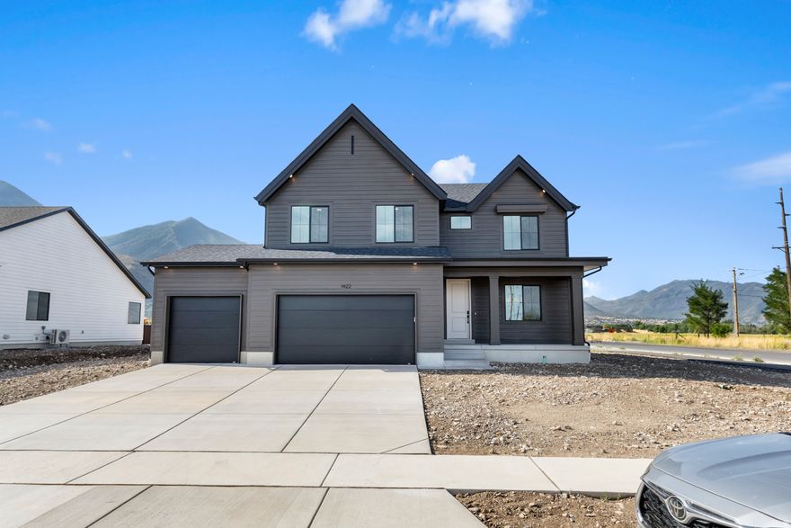 THIS HOME HAS AN RV GARAGE AND BASEMENT ENTRANCE Welcome to the beautiful 2-story Topaz floorplan in our Viridian community! $7,000 concession towards closing costs with preferred lender, ask about our rate incentives* This thoughtfully designed 4-bedroom home offers comfort, functionality, and style in every detail. The main level features 9' ceilings and a spacious family room that flows seamlessly into the grand gourmet kitchen-perfect for entertaining. The kitchen showcases 42" upper cabinets with crown molding, upgraded soft-close cabinetry, stainless steel gas appliances, and sleek quartz countertops in both the kitchen and bathrooms. Durable laminate flooring extends through the kitchen, dining, and family areas, adding both elegance and convenience. A cozy front office with French doors provides the perfect spot for working from home or a quiet retreat. Upstairs, the private Bedroom 1 suite includes a tray ceiling and a luxurious grand bath complete with a garden tub, walk-in shower, and dual vanity sinks. Additional features include a mudroom bench, 50-gallon water heater, and an unfinished basement with a separate entrance-offering incredible potential for a future ADU, rental suite, or extra living space. With its versatile layout, premium finishes, and future-ready design, the Topaz is a home that truly has it all. Ask me about our generous home warranties, active radon Mitigation System, and Smart Home Package, which is included in this home. The actual home may differ in color, material, and/or options. Pictures are of a finished home of the same floor plan, and the available home may contain different options, upgrades, and exterior color and/or elevation style. Square footage figures are provided as a courtesy estimate only and were obtained from building plans. No representation or warranties are made regarding school districts and assignments; please conduct your own investigation regarding current/future school boundaries.