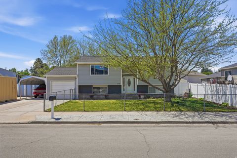 Photo of 3299 W ROYALWOOD DR S, Taylorsville, UT 84129 (MLS # 2157793)