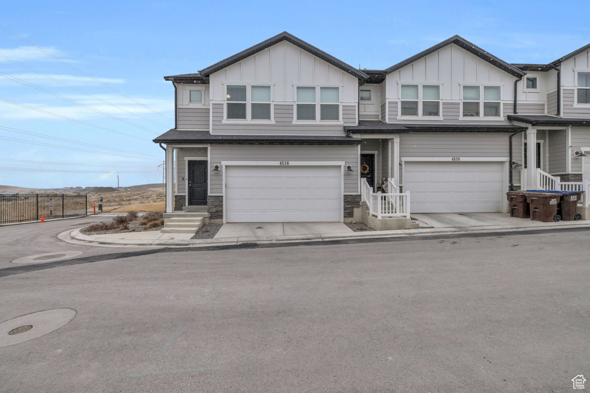 Stunning End-Unit Townhome with Breathtaking Views in Scenic Mountain  Welcome to this exceptional 4-bedroom, 3.5-bathroom end-unit townhome in the highly sought-after Scenic Mountain community of Eagle Mountain. Boasting unobstructed views of the Wasatch Mountains and Utah Lake, this home offers both serenity and modern convenience.  Step inside to an inviting open-concept main level with soaring 9' ceilings and stylish waterproof laminate flooring.. The spacious living room features a ceiling fan for added comfort, while the well-appointed kitchen offers ample storage and prep space.  The fully finished basement provides additional living space, ideal for a home theater, gym, or guest retreat. Upstairs, the primary suite is a true sanctuary with an en-suite bath, walk-in closet, and ceiling fan for year-round comfort.  Located within walking distance to the community swimming pool, this townhome combines modern finishes with an unbeatable location.  Buyer to verify all information. Square footage figures are provided as courtesy and were obtained from county records