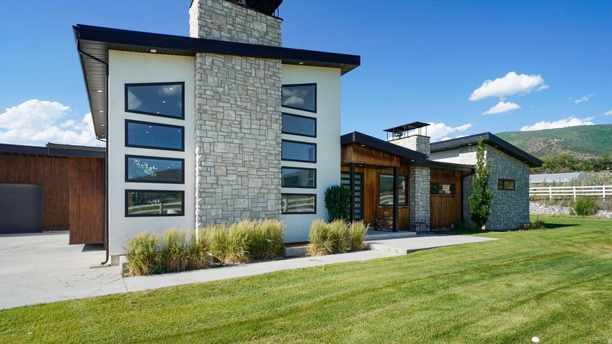 Experience custom luxury and modern design in this stunning, spacious home that offers privacy, comfort, and a seamless connection to nature. Soaring ceilings, expansive windows, and warm contemporary finishes flood the home with natural light and bring the outdoors in. Ideally located just minutes from Deer Creek Reservoir, Sundance Ski Resort, and National Forest access, adventure is always within reach. Enjoy the perfect balance of seclusion and convenience with Provo and Midway/Heber Valley only a short drive away for shopping, dining, and everyday amenities. Designed for both comfort and self-sufficiency, the property features fresh water from a private well and includes a whole-house generator for peace of mind. Additional amenities include: Luxurious primary suite, Whole-house surround sound, Central vacuum system, Dedicated dog wash room, Drinking fountain, Spacious bunk room, Outdoor firepit, Sauna and hot tub, Fruit trees, and much more. Contact the listing agent today for additional details and to schedule your private showing.