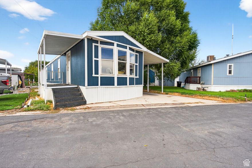 Updated manufactured home with a great layout and updated AC, flooring, cabinets, paint, bathrooms, and fixtures (all in 2024).   Westcrest Mobile Home Park has great amenities with onsite management and is pet friendly!  Soak up some sun by the pool and walk to the dog park with your furry friend.  2 fully remodeled bathrooms and bedrooms!  Buyers please apply at KMCMH.com and use application #175 with code 175abc.  Lot rent is $1076.