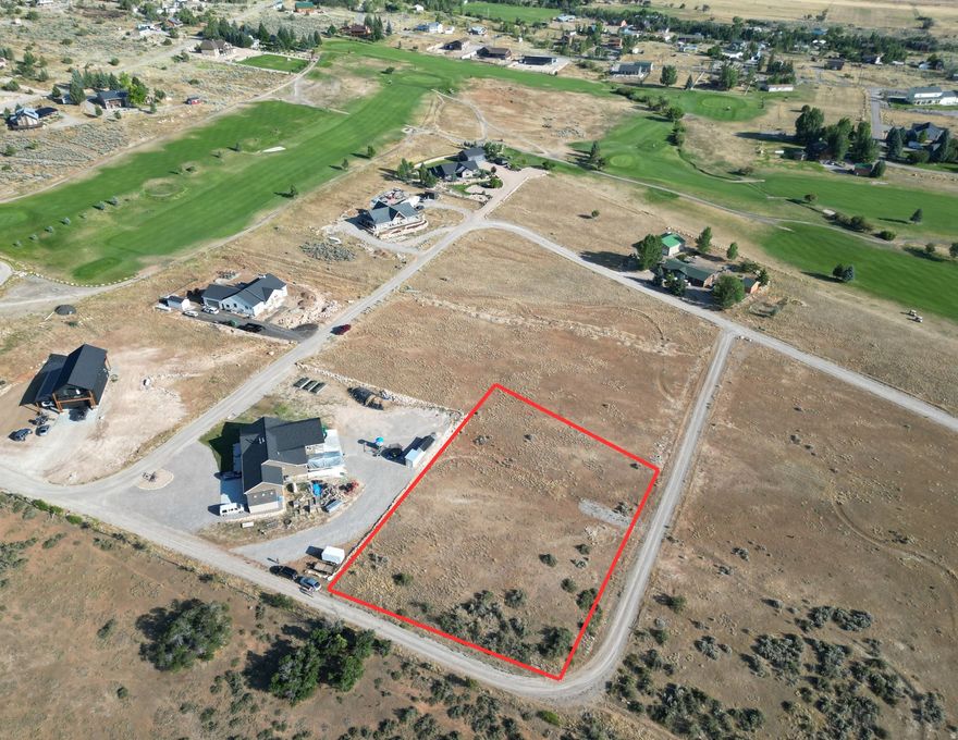 Build your dream home on this spacious golf course lot at Skyline Mountain Resort, one of the area's most sought-after mountain communities. Located on the furthest north side of the resort, this lot offers more peace, quiet, and privacy than many other locations, creating the perfect setting to enjoy the beauty of the surrounding countryside. Positioned just steps from holes 7 and 8 of the Skyline Mountain Resort Golf Course, this property sits in a highly desirable neighborhood where deer, turkey, and other wildlife frequently pass through, adding to the natural charm and relaxed mountain lifestyle. This property is truly the best bang for your buck-competitively priced for its generous size and with utility connection fees already paid, saving you significant upfront costs and making it an exceptional opportunity for building. Enjoy plenty of elbow room while still having easy access to outdoor recreation including golf, hiking, camping, and ATV riding just minutes from your doorstep. Skyline Mountain Resort also offers fantastic amenities, including a swimming pool, RV campground, rental cabins, tennis courts, pickleball courts, and more. Don't miss your chance to create your own slice of heaven in this peaceful mountain golf community. All information is provided as a courtesy. Buyer and buyers agent to perform their own due diligence.