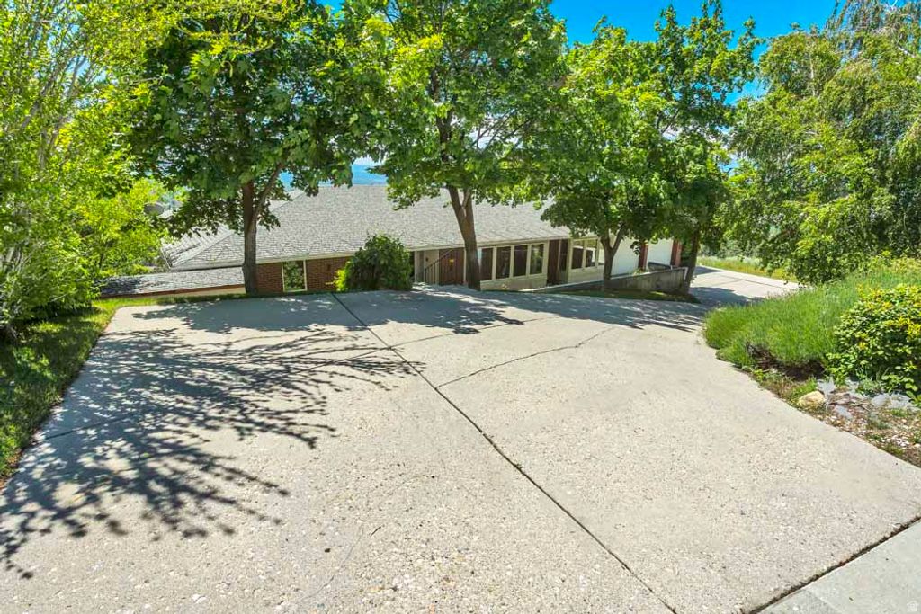 Photo of 1232 E CHANDLER CIR N, Salt Lake City, UT 84103 (MLS # 2154974)