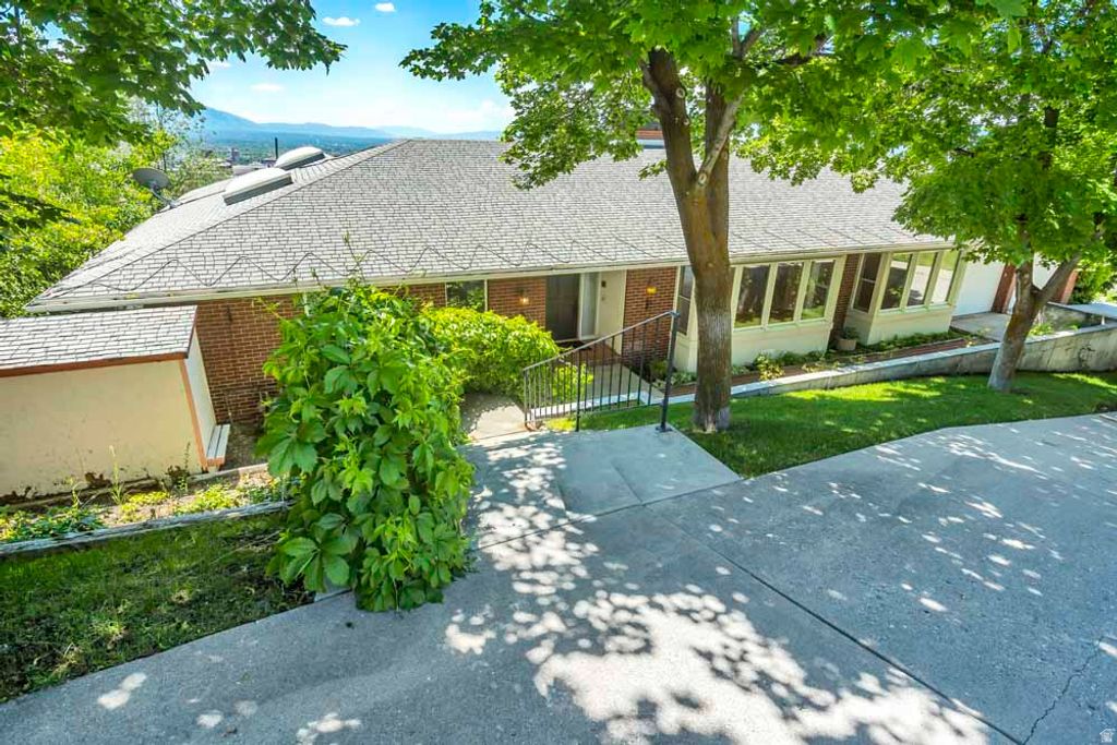Photo of 1232 E CHANDLER CIR N, Salt Lake City, UT 84103 (MLS # 2154974)