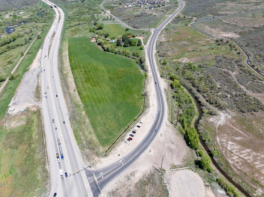 ***SALE FAILED*** Buyer's funding failed. Now's your chance to capture this prime real estate in BOOMING Heber Valley!  Property is being sold with the following parcels: 00-0020-0369, 00-0015-5502, 00-0007-7516, 00-0014-3177 for a total of 23.35 acres. Property is zoned agricultural but sits within the North Village Overlay Zone for both Heber City and Wasatch County overlays. These overlays permit commercial use with a certain number of ERUs per respective zone. This land is prime real estate with high traffic visibility coming into Heber Valley. Utility and sewer entitlements all complete. Existing water shares negotiable for inclusion. Property taxes are currently under greenbelt. Perfect land for any desired use. Acreage and property info is obtained from county records. Seller makes no warranty as to accuracy of the public information. Buyer is advised to verify all information.