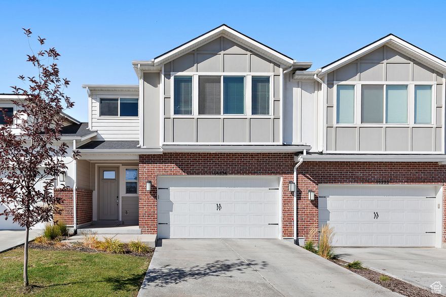 *Immaculate Luxury Townhome with breathtaking Mountain Views in the highly sought-after Bella Vea subdivision in Herriman! Blending luxury living with everyday functionality. 9 ft ceilings. 8 ft doors. HARDWOOD Floors. Modern gas fireplace.  *Quartz countertops, custom white staggered cabinetry with crown molding, subway tile backsplash, stainless steel appliances, gas stove, oversized island and a spacious walk-in pantry with a costco door into the garage. Concrete patio, built-in gas BBQ line. No mowing!!  *Luxurious Primary Suite featuring an ensuite bathroom with dual-sink vanity, Euro glass shower, dual shower heads and walk-in closet. Wet bar and abundant storage in basement.  Agent related to seller. *HOA-covered landscaping & snow removal  *HOA amenities: pool, hot tub, pickleball court, and more  *Ideally located near Mountain View Corridor, Mountain View Village, Zion's Bank Stadium, Blackridge Reservoir, schools, parks, hiking trails, and major commuter routes.