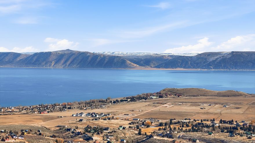 Privacy preserved - no short-term rental chaos!! Welcome to the extremely rare 1.19 acres of elevated opportunity on Panorama Drive in Garden City, nestled in the sought-after Sweetwater Subdivision 3. True to its name, this homesite delivers sweeping, unobstructed views of Bear Lake-the kind that stop you mid-sentence and remind you why you chose this lifestyle in the first place.  This is not a crowded vacation lot-this is room to breathe. With nearly an acre and a quarter, you have the flexibility to design a custom primary residence that fits your vision: expansive windows to frame the lake, generous outdoor living spaces, and the privacy that only a larger parcel can provide.  While overnight stays and short-term rentals are not permitted, that's exactly what preserves the peace, pride of ownership, and long-term value of the neighborhood. Sweetwater Subdivision 3 is ideal for homeowners who want consistency, quiet, and community-not transient traffic. Think morning coffee overlooking the water, golden sunsets from your deck, and a home that feels like a retreat every single day.  Located minutes from town amenities, lake access, dining, and year-round recreation, this lot offers the perfect balance of privacy and proximity. Build now or hold for the future-either way, opportunities like this on Panorama Drive are increasingly rare.