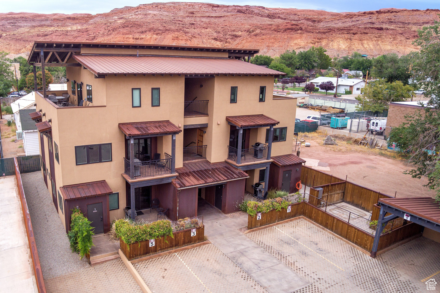 Discover 57 Robbers Roost, Unit #2-a 1,095 sq. ft., 2-bedroom, 2-bath condo in the heart of downtown Moab. This spacious unit is fully turn-key, featuring a full kitchen, washer and dryer, central air, fiber internet, bike storage, BBQ grill, and both covered and uncovered parking. Owners and guests can enjoy shared amenities, including a bike repair station, making it the perfect base for red rock adventures. When you're in Moab, it feels like home; when you're away, offset expenses with the opportunity for short-term rentals. Just steps from local restaurants, shops, bars, and year-round events, this property offers the best of convenience and comfort.