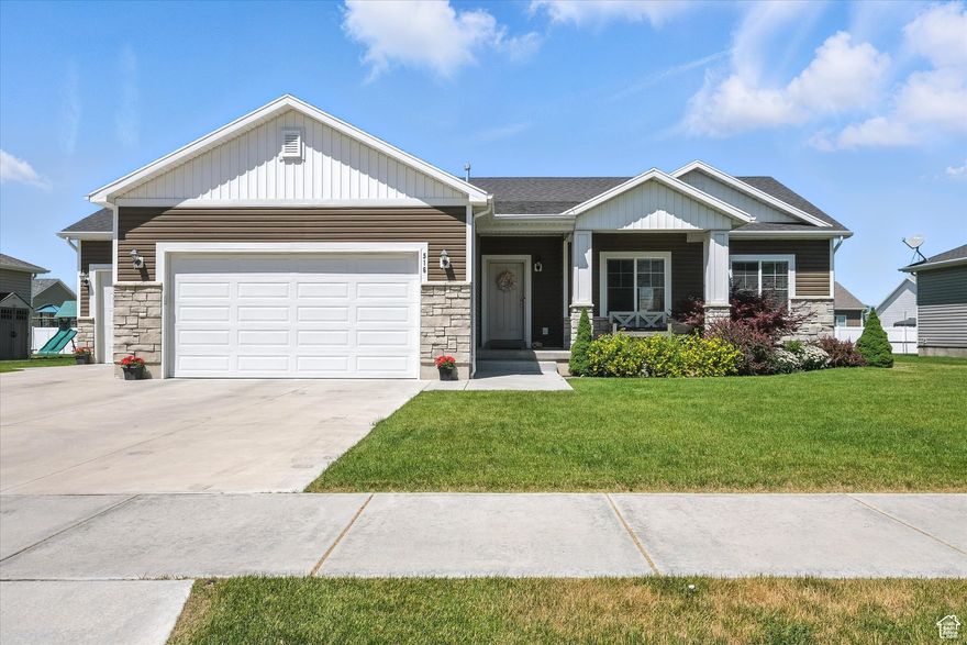 Beautiful 5-Bedroom Home with Mountain Views in Hyrum, UT Discover comfort and space in this well-maintained 5-bedroom, 3-bathroom home located in the peaceful community of Hyrum. Built in 2018 and spanning 3,018 sq. ft., this home offers a thoughtful layout, a 3-car garage, and stunning mountain views all on a beautifully landscaped lot. The main level features an open-concept kitchen and great room, ideal for both daily living and entertaining. You'll find three spacious bedrooms, including a bright owner's suite with a separate tub and shower, as well as a main-laundry room for added convenience. Downstairs, the fully finished basement includes two additional bedrooms, a full bathroom, a den, family room with speakers wired in and ample storage space providing flexibility for guests & hobbies. Outside, enjoy the serenity of a fully landscaped yard with mature trees, a vegetable garden, and partial fencing. Located near schools and shopping, yet tucked away in a quiet setting, this home offers the best of both convenience and tranquility.