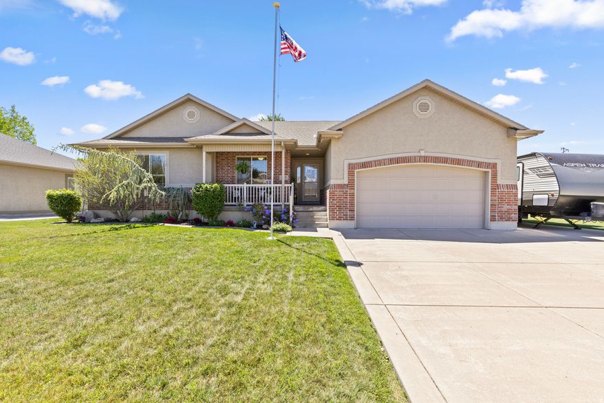 Located in one of Riverdale's most sought-after neighborhoods, this meticulously well cared for home gives you the best of both worlds - close to everything you need, but tucked away enough to enjoy the peace and quiet at the end of the day. The open layout, vaulted ceilings, and natural light create a warm, welcoming feel from the moment you walk in. The open layout flows perfectly together in a nice open space. And if you've always dreamed of being the host with the most... this basement was made for you. Featuring an incredible entertaining space complete with a custom bar area, massive family room, polished concrete floors, and endless room to gather. Outside, enjoy the evenings under the covered patio or around the fire pit. This backyard is designed for relaxing, playing, and making memories. This home includes so many extras, including: a 30 amp trailer hookup, natural gas line for BBQ grill, LVP flooring, and so much more! Square footage figures are provided as a courtesy estimate only and were obtained from county records. Schedule your showing today! Buyer is advised to obtain an independent measurement.