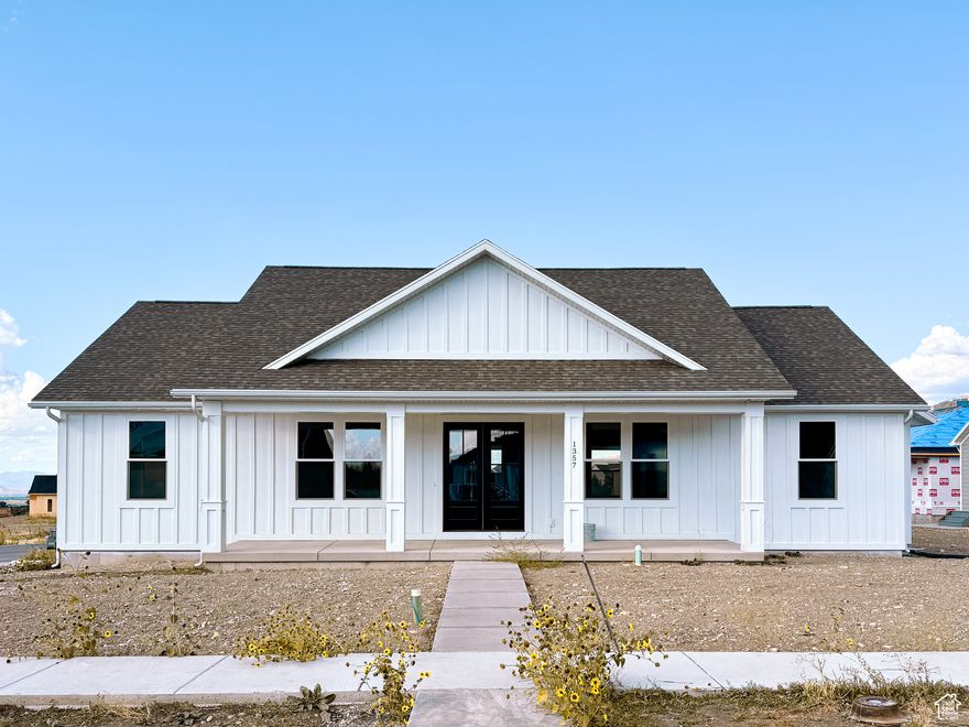 Welcome to this BRAND-NEW 3-bedroom, 2.5-bath farmhouse that perfectly blends timeless rustic charm with modern comfort. Expertly crafted with quality finishes on a spacious lot in North Logan with stunning valley VIEWS. Enjoy the tranquility of country living without sacrificing the convenience of nearby amenities. Plus, take advantage of a $10,000 CREDIT towards closing costs or interest rate buydowns-an incredible opportunity to make this home even more affordable.