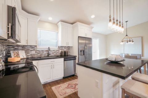 Tiny photo for 5350 S HEW WOOD DR, Taylorsville, UT 84129 (MLS # 2135294)